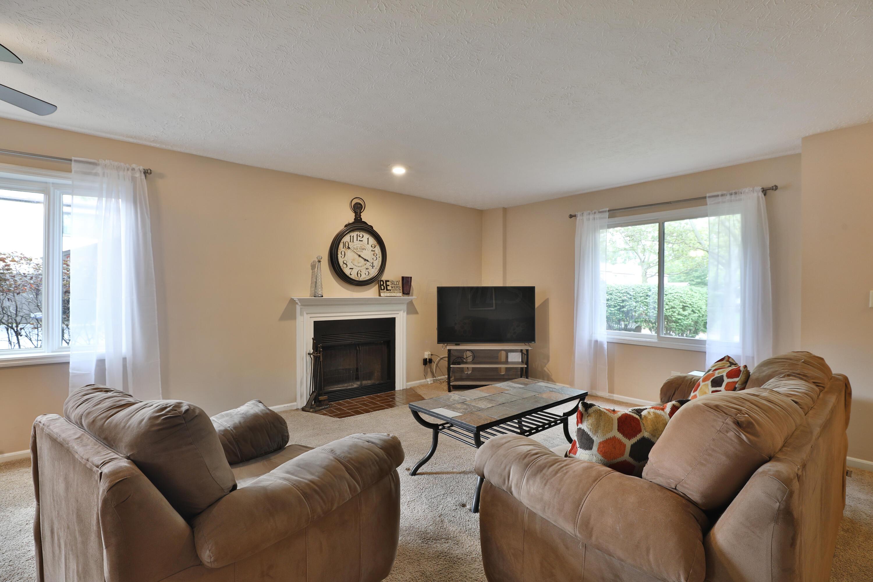 5365 Reed Road Columbus, OH 43235 - Photo 5 of 37 Open Living Room w/ Wood Burning Fireplace
