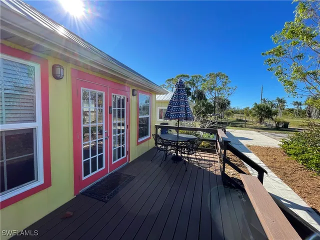 a view of a wooden door of the house