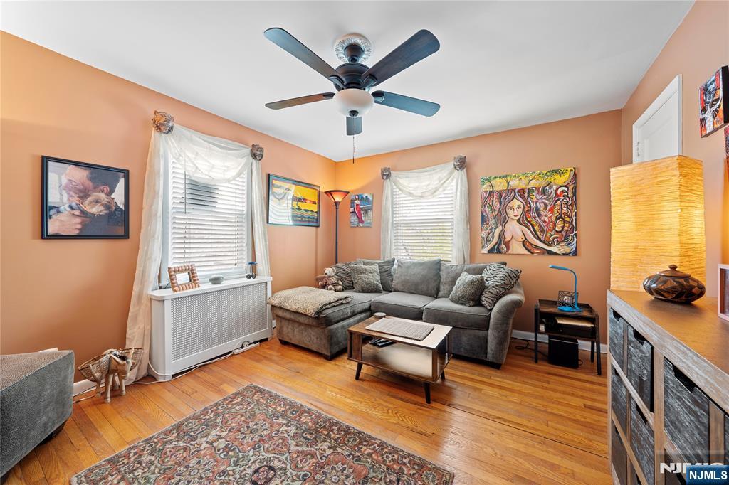 5 Leo Terrace Bloomfield, NJ 07003 - Photo 14 of 32 a living room with furniture and a large window