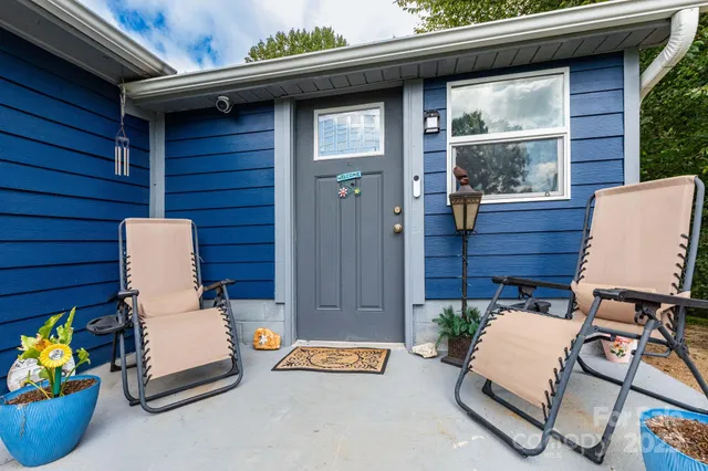 a building outdoor space with patio furniture
