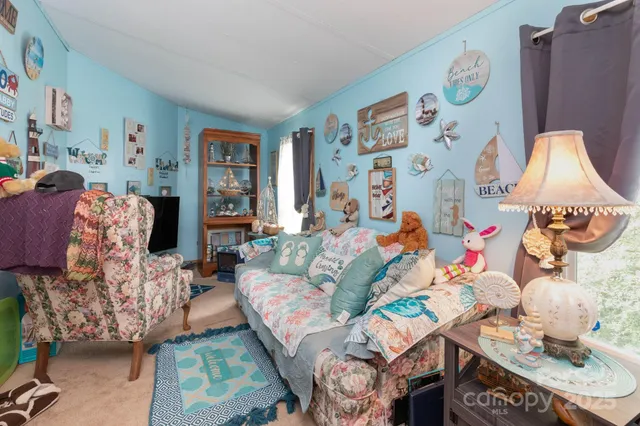 a living room with furniture and a couch