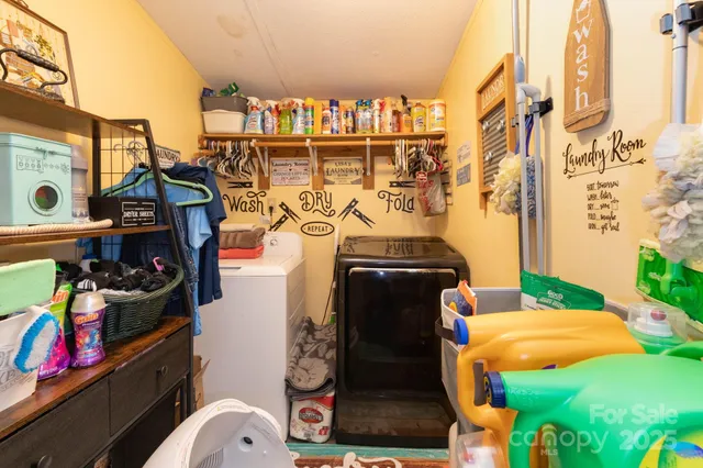 a utility room with lots of different colored cloths