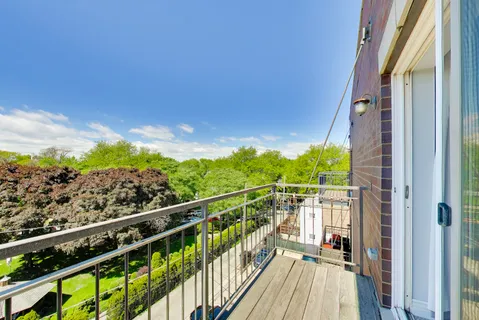 a view of city from a balcony