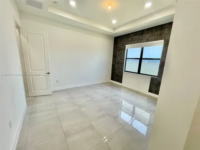 a view of a hallway with entryway