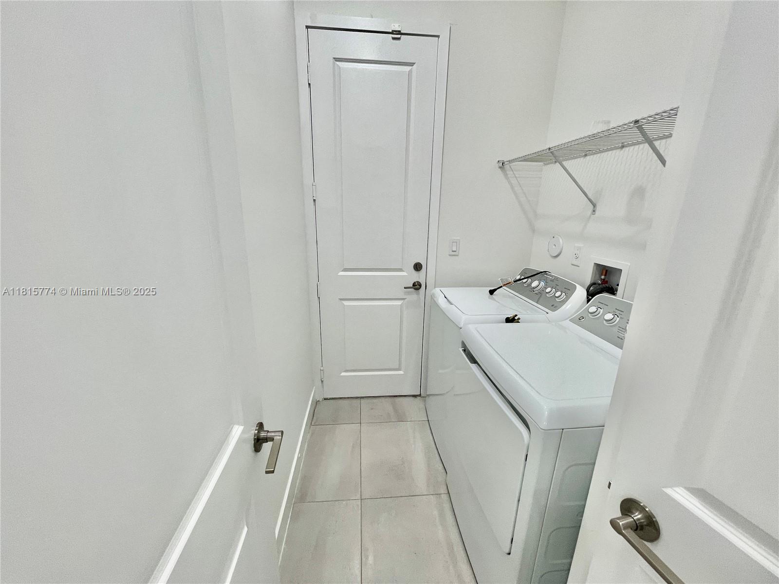 17324 Southwest 41st Street, Unit 17324 Miramar, FL 33029 - Photo 15 of 30 a utility room with dryer and washer