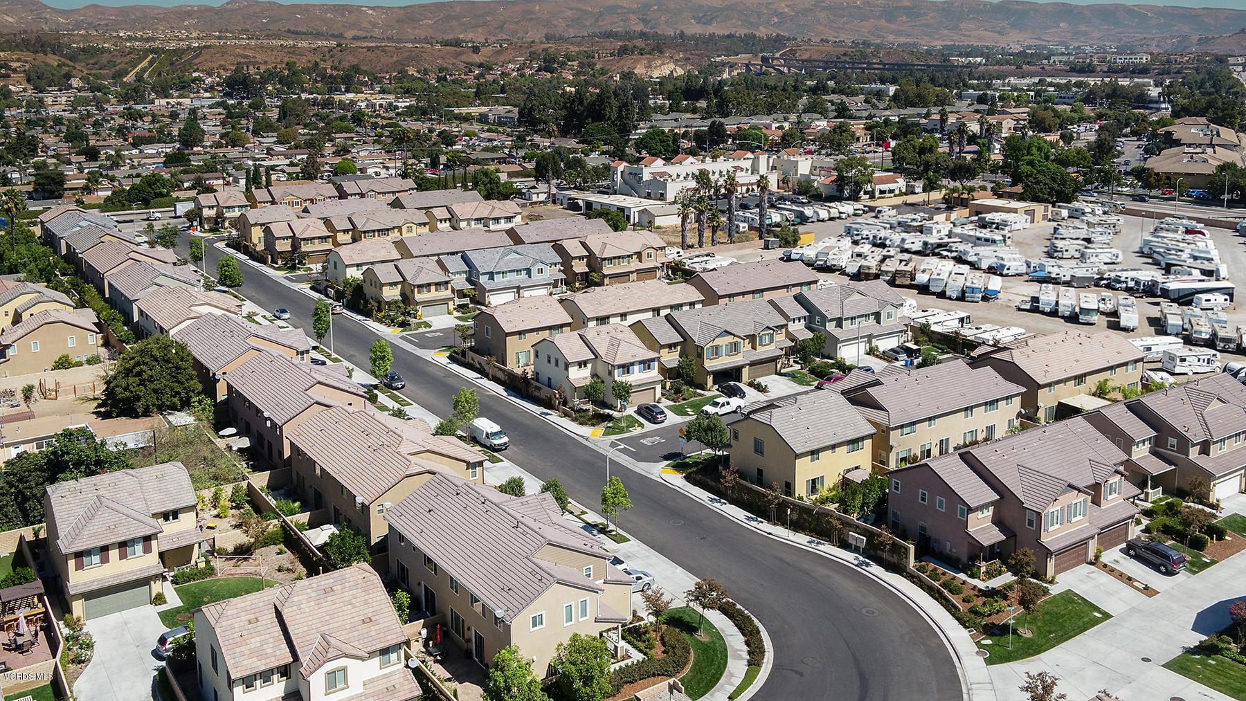 4909 Edenbridge Road Moorpark, CA 93021 - Photo 3 of 34 an aerial view of a city with lots of residential buildings