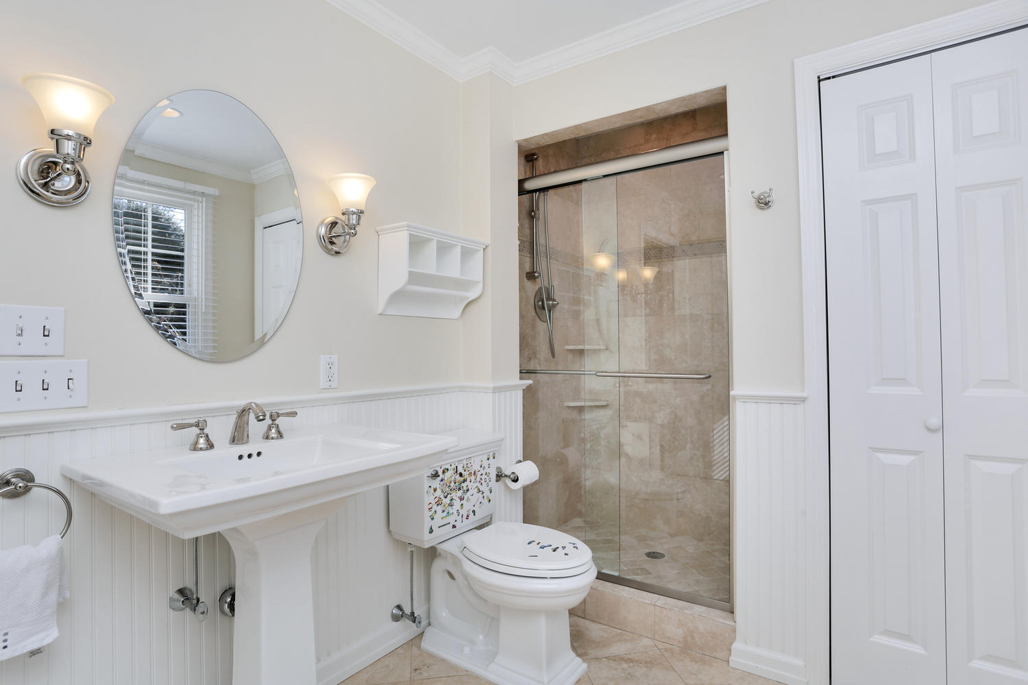 19 Walmsley Road Darien, CT 06820 - Photo 13 of 30 a bathroom with a sink toilet and shower