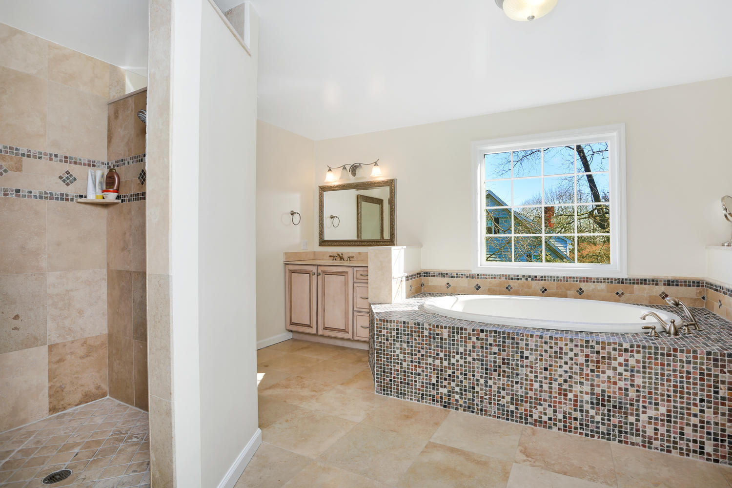 19 Walmsley Road Darien, CT 06820 - Photo 18 of 30 a spacious bathroom with a tub sink and mirror