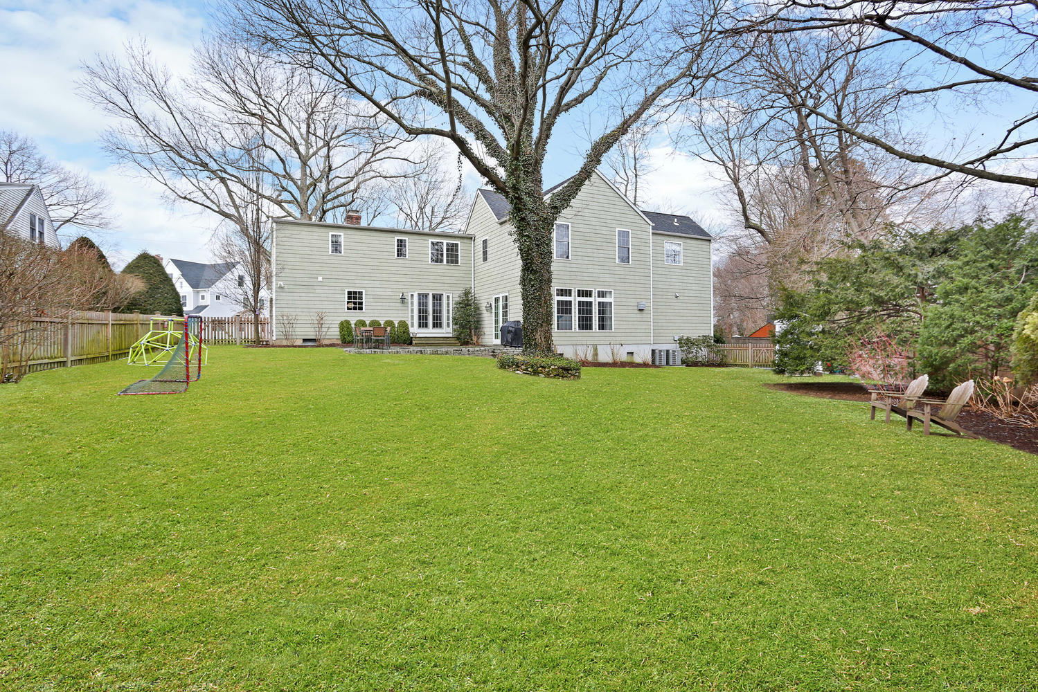 19 Walmsley Road Darien, CT 06820 - Photo 2 of 30 a view of a tree in front of a house