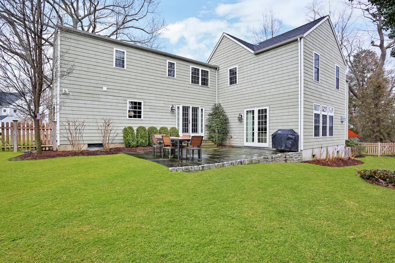 19 Walmsley Road Darien, CT 06820 - Photo 3 of 30 a view of a house with a backyard and a tree
