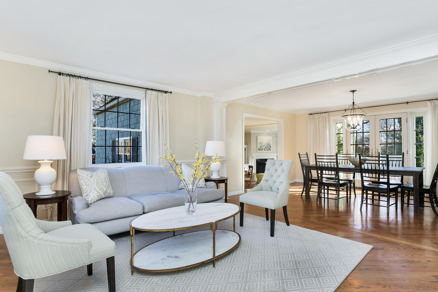 19 Walmsley Road Darien, CT 06820 - Photo 4 of 30 a living room with furniture and a table