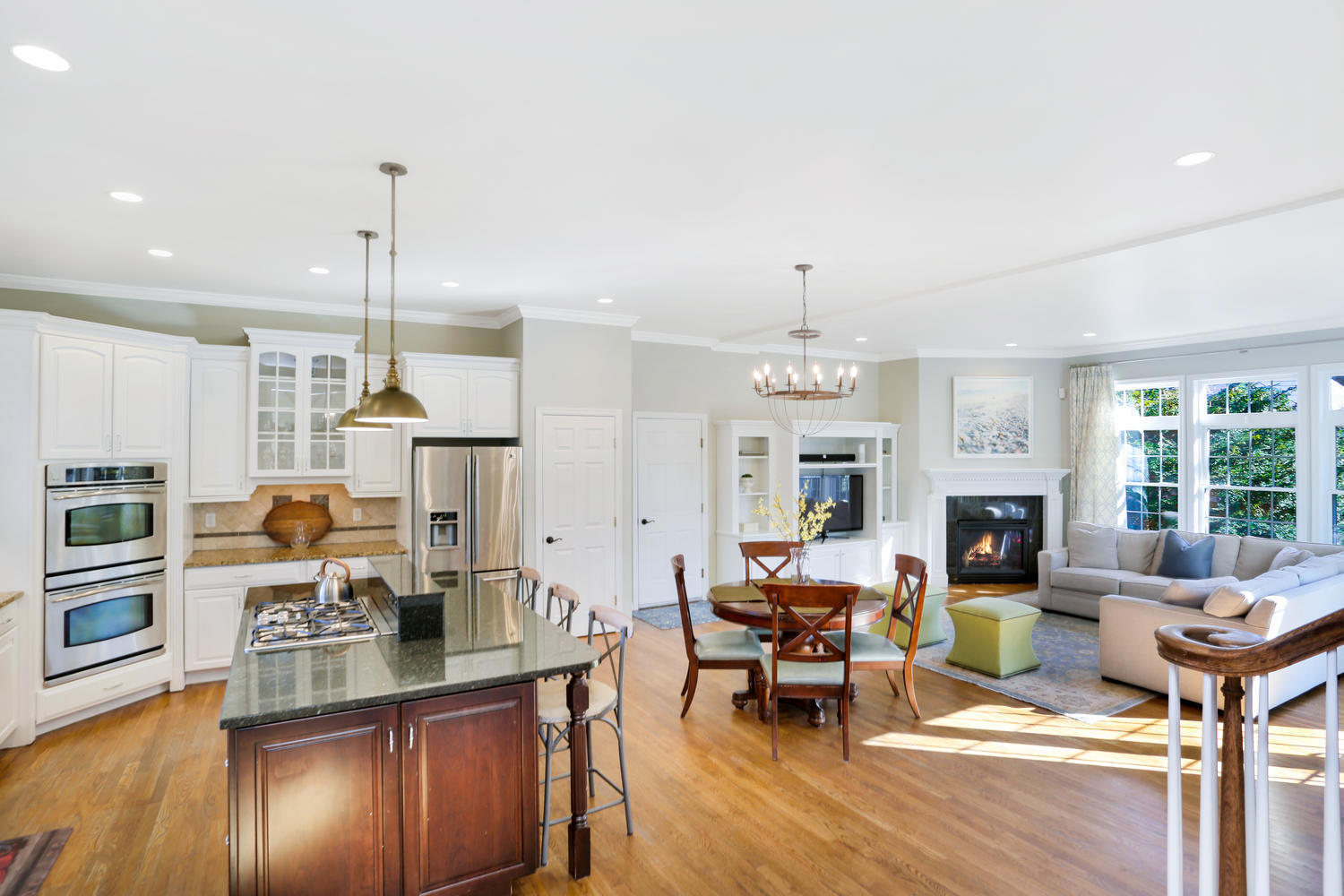 19 Walmsley Road Darien, CT 06820 - Photo 7 of 30 a living room with fireplace furniture and a chandelier