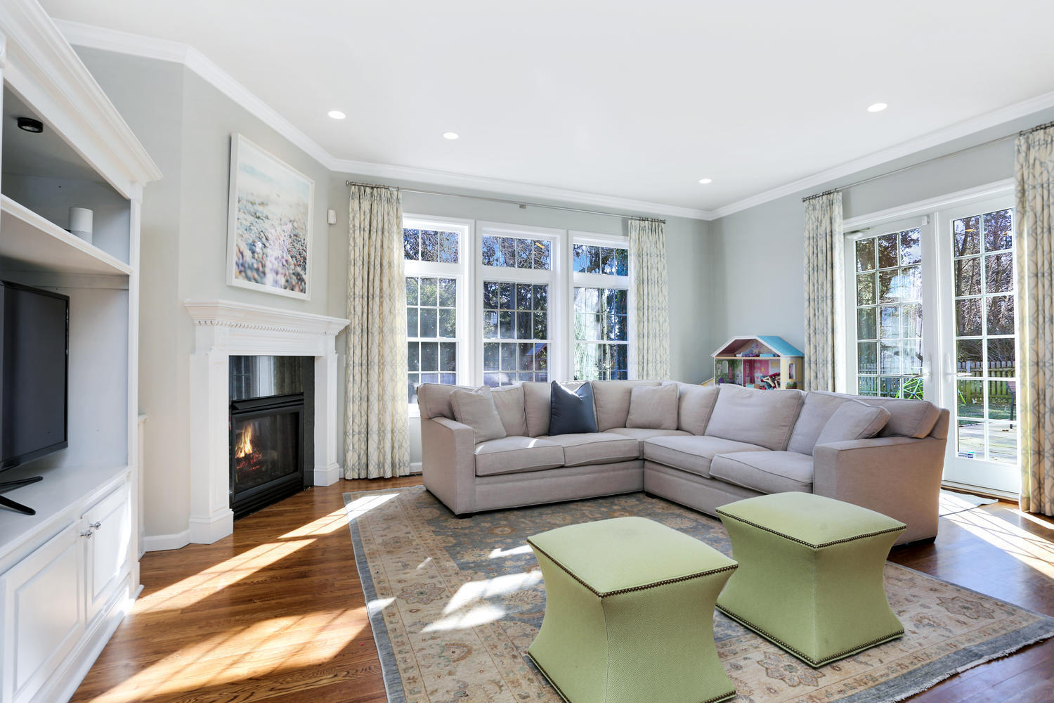 19 Walmsley Road Darien, CT 06820 - Photo 10 of 30 a living room with furniture and a fireplace