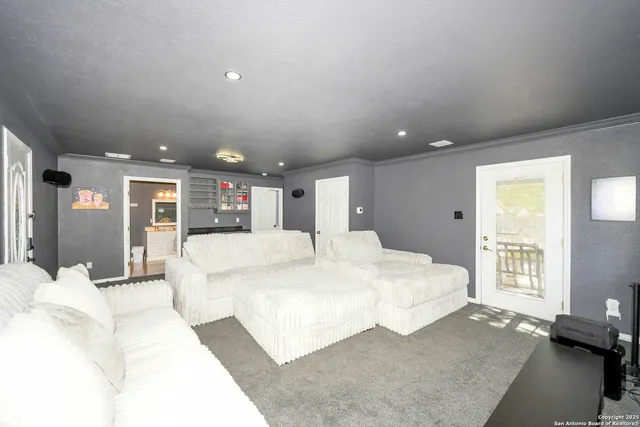 a large white bed in a large room