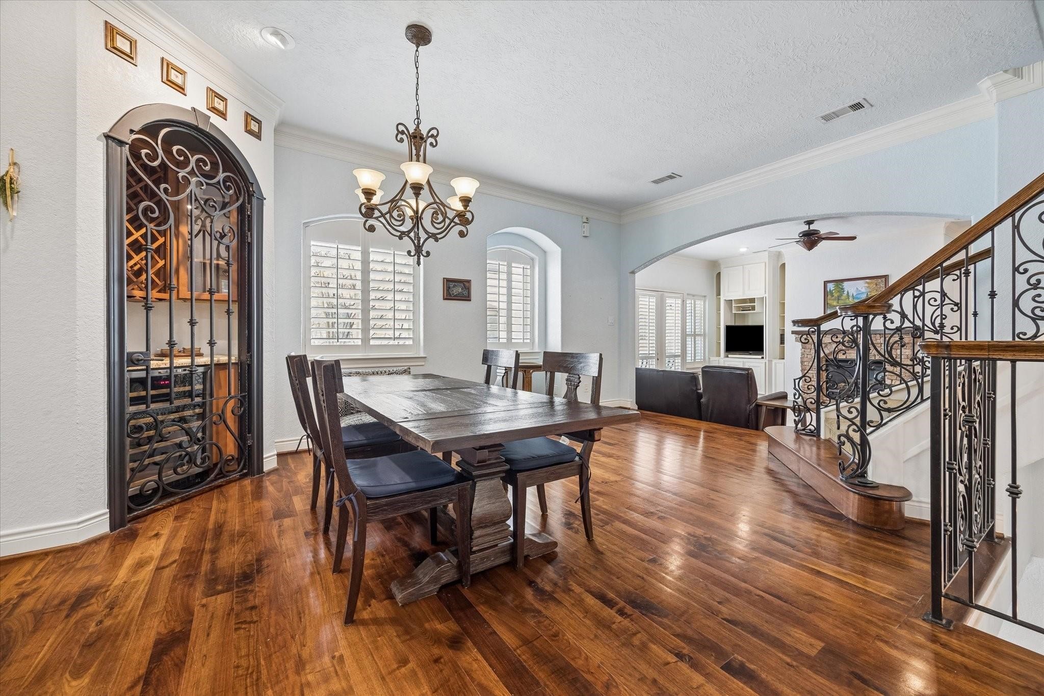 2128 Harold Street, Unit A Houston, TX 77098 - Photo 2 of 14 a view of a dining room with furniture window and wooden floor
