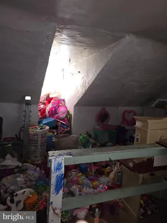 a room with lots of different colored cloths