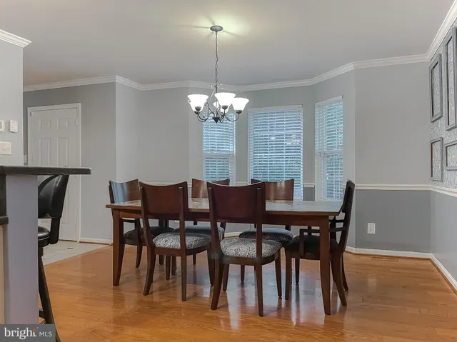 a living room with fireplace furniture and a flat screen tv