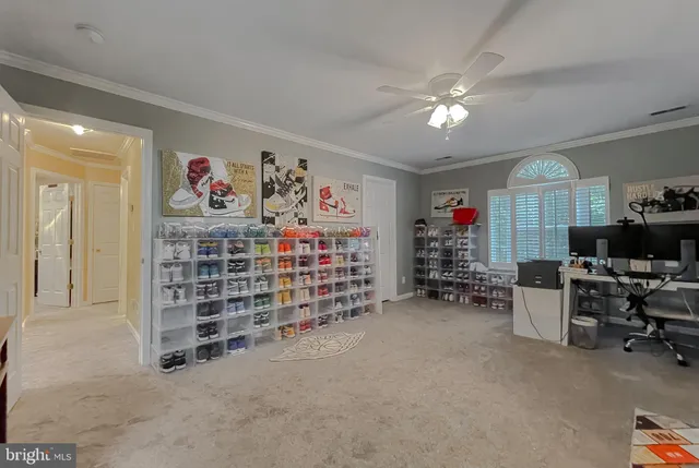 a room with a sink cabinets and utility room