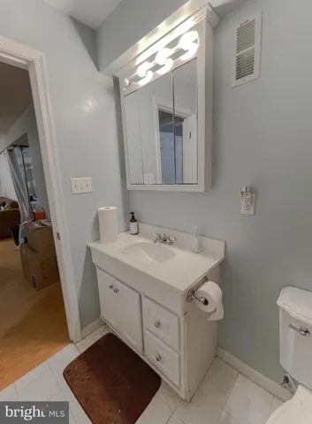 a view of a lake with beach and outdoor space