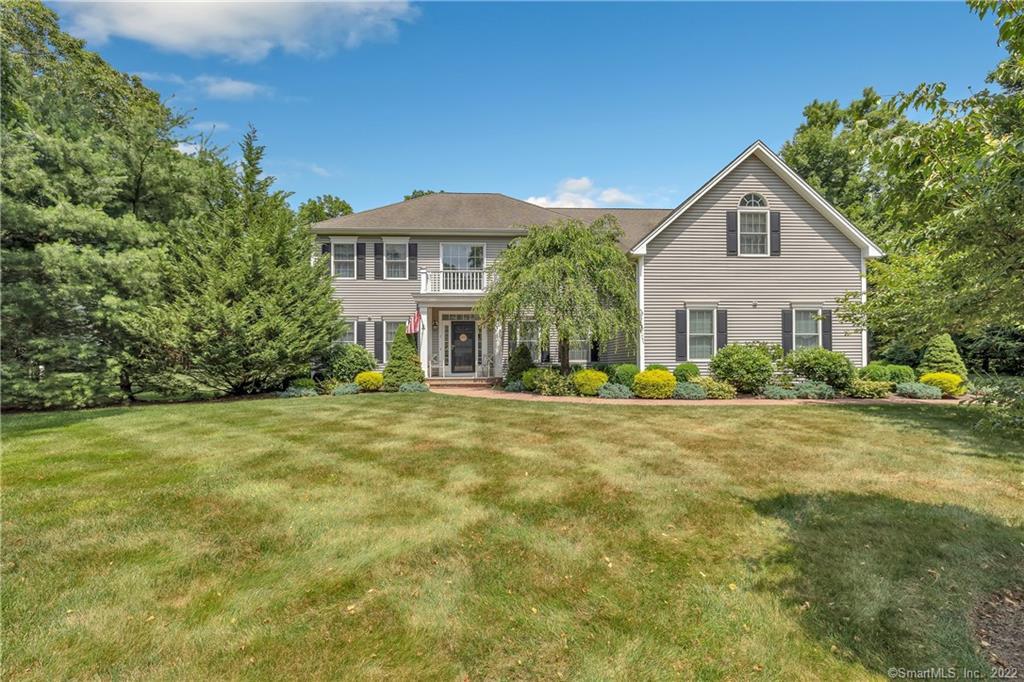 1 Lazy Brook Road Shelton, CT 06484 - Photo 1 of 1 a front view of a house with a garden