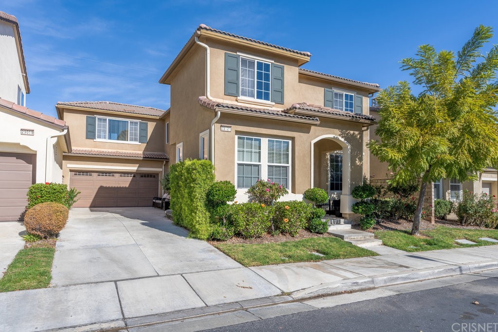 29021 Mirada Circulo Valencia, CA 91354 - Photo 1 of 57 a front view of a house with garden
