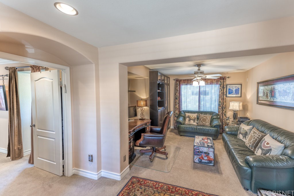 29021 Mirada Circulo Valencia, CA 91354 - Photo 20 of 57 a living room with furniture and a window