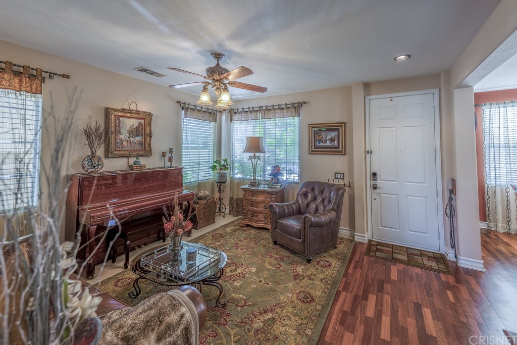 29021 Mirada Circulo Valencia, CA 91354 - Photo 3 of 57 a living room with furniture and a wooden floor