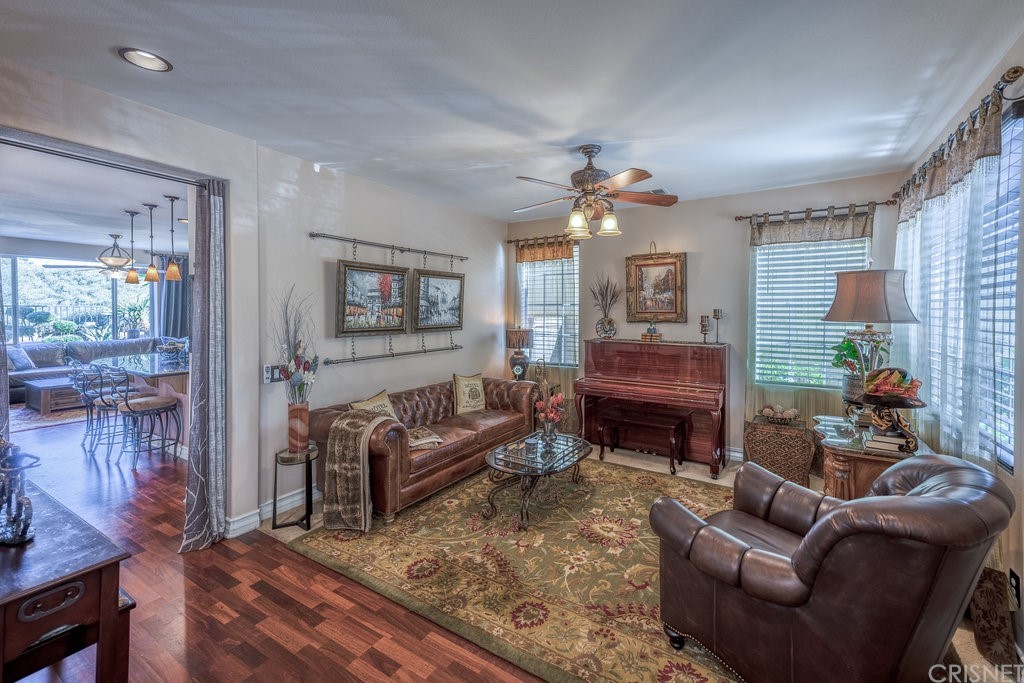 29021 Mirada Circulo Valencia, CA 91354 - Photo 4 of 57 a living room with furniture and a fireplace