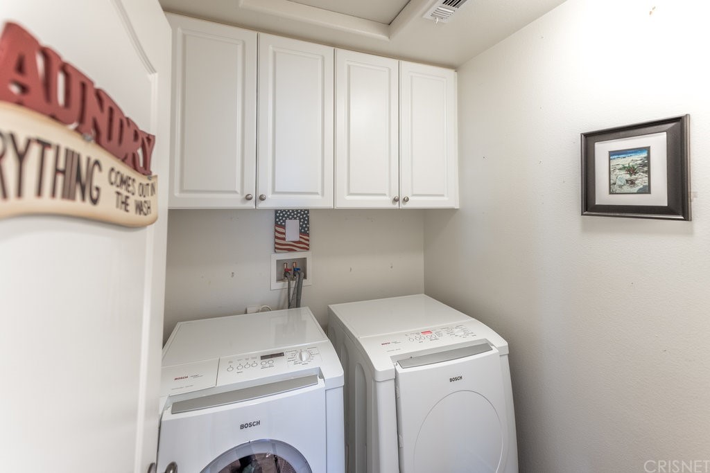 29021 Mirada Circulo Valencia, CA 91354 - Photo 32 of 57 a utility room with dryer and washer