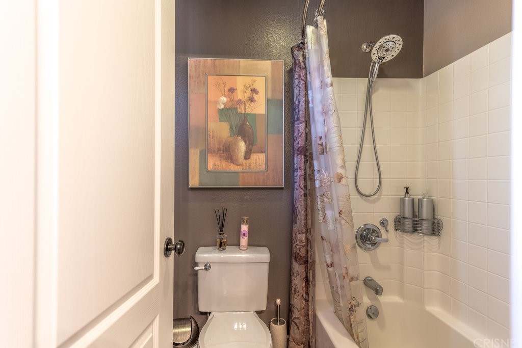 29021 Mirada Circulo Valencia, CA 91354 - Photo 34 of 57 a bathroom with a granite countertop bathtub shower sink vanity and toilet
