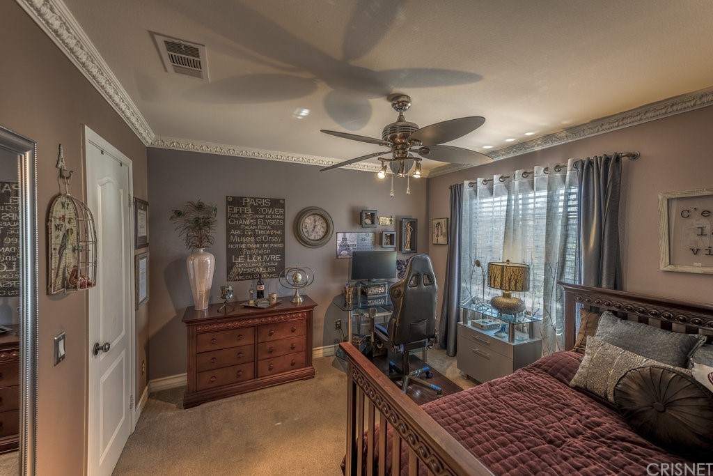 29021 Mirada Circulo Valencia, CA 91354 - Photo 35 of 57 a bedroom with furniture and a window