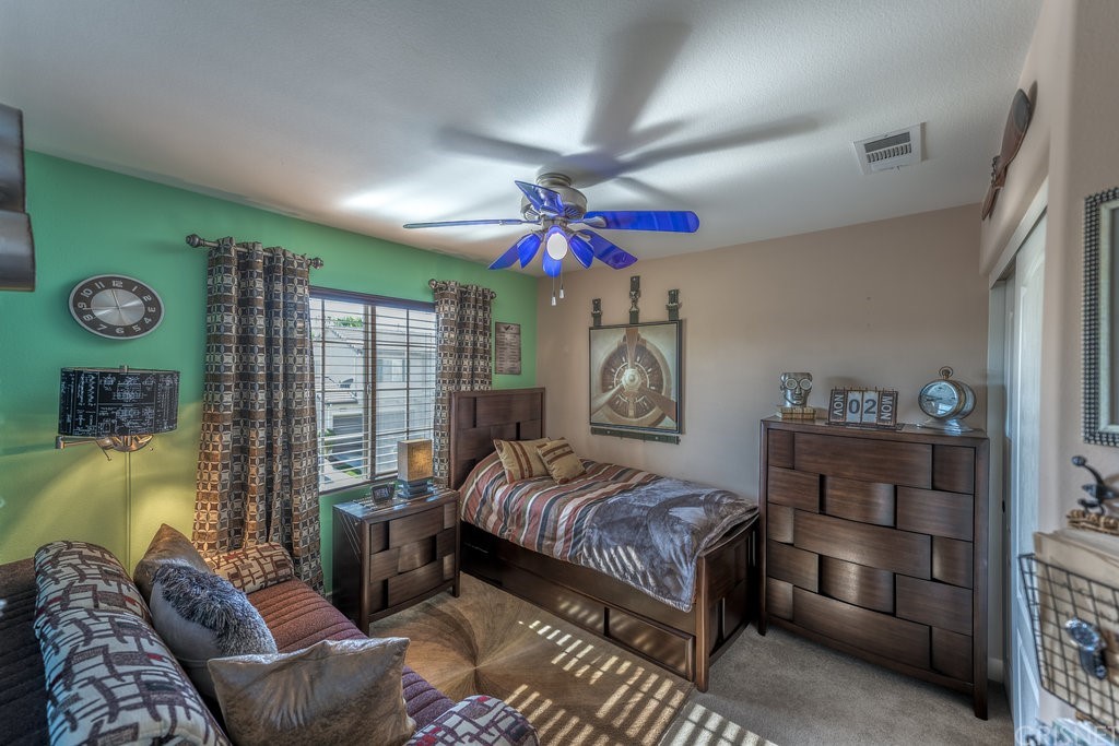 29021 Mirada Circulo Valencia, CA 91354 - Photo 37 of 57 a bedroom with a bed and a window