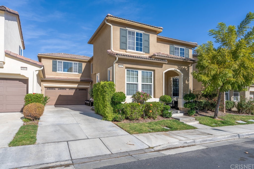 29021 Mirada Circulo Valencia, CA 91354 - Photo 42 of 57 a front view of a house with garden