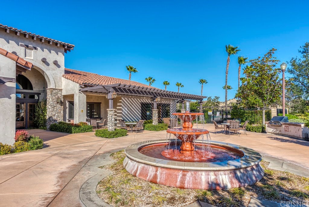 29021 Mirada Circulo Valencia, CA 91354 - Photo 47 of 57 a front view of a house with a yard