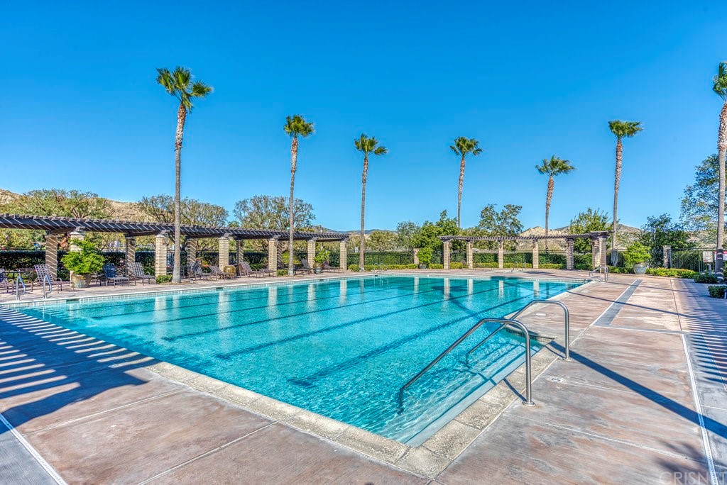 29021 Mirada Circulo Valencia, CA 91354 - Photo 49 of 57 a view of a swimming pool with a yard