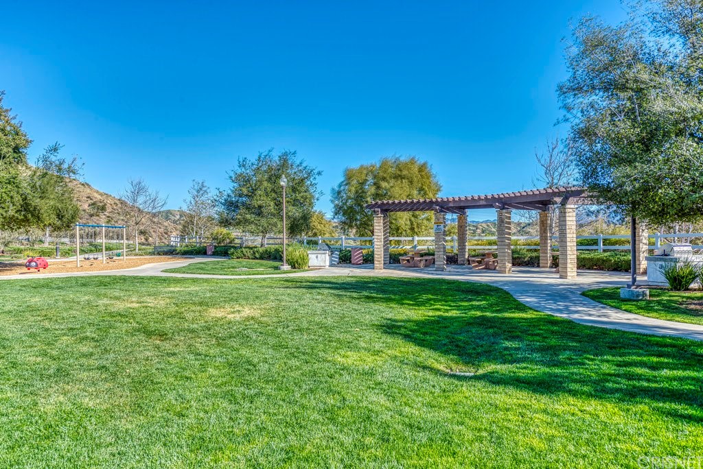 29021 Mirada Circulo Valencia, CA 91354 - Photo 53 of 57 a view of a house with a big yard