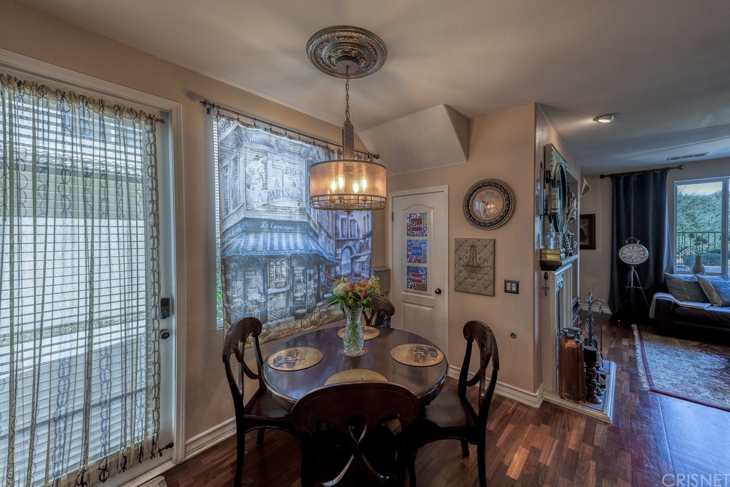 29021 Mirada Circulo Valencia, CA 91354 - Photo 10 of 57 a view of a dining room with furniture window and wooden floor