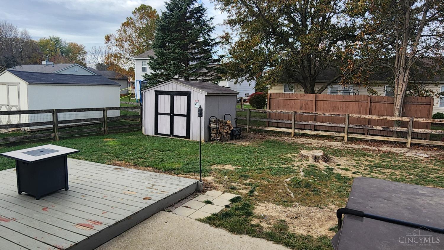 707 Hummingbird Way Maineville, OH 45039 - Photo 19 of 24 On to the backyard. It features a shed, 2 deck areas, fenced yard and more