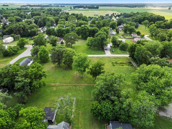 419 Clay Street Morocco, IN 47963 - Photo 14 of 15 an aerial view of a residential houses with outdoor space and trees all around