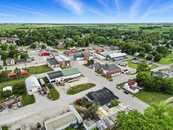 419 Clay Street Morocco, IN 47963 - Photo 15 of 15 an aerial view of residential houses with outdoor space and trees