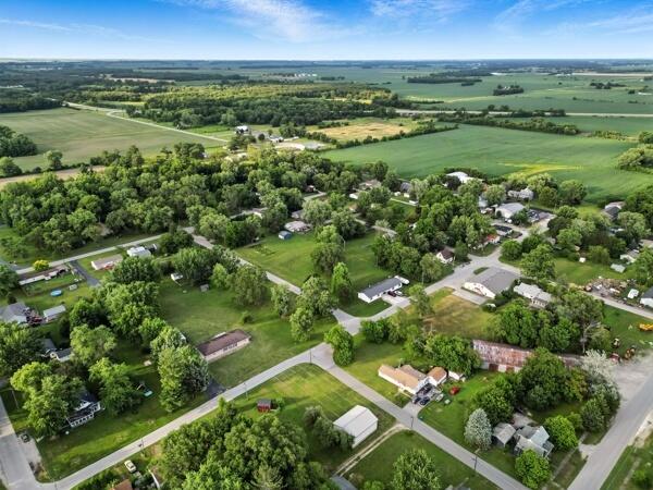 419 Clay Street Morocco, IN 47963 - Photo 2 of 15 an aerial view of residential houses with outdoor space and trees