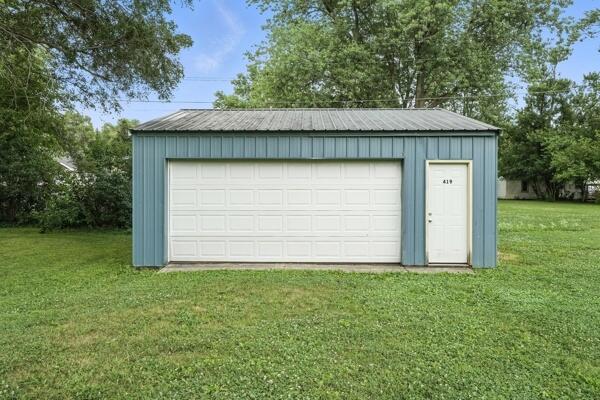 419 Clay Street Morocco, IN 47963 - Photo 7 of 15 a view of backyard of house with green space