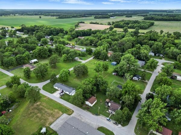 419 Clay Street Morocco, IN 47963 - Photo 10 of 15 an aerial view of a forest with houses
