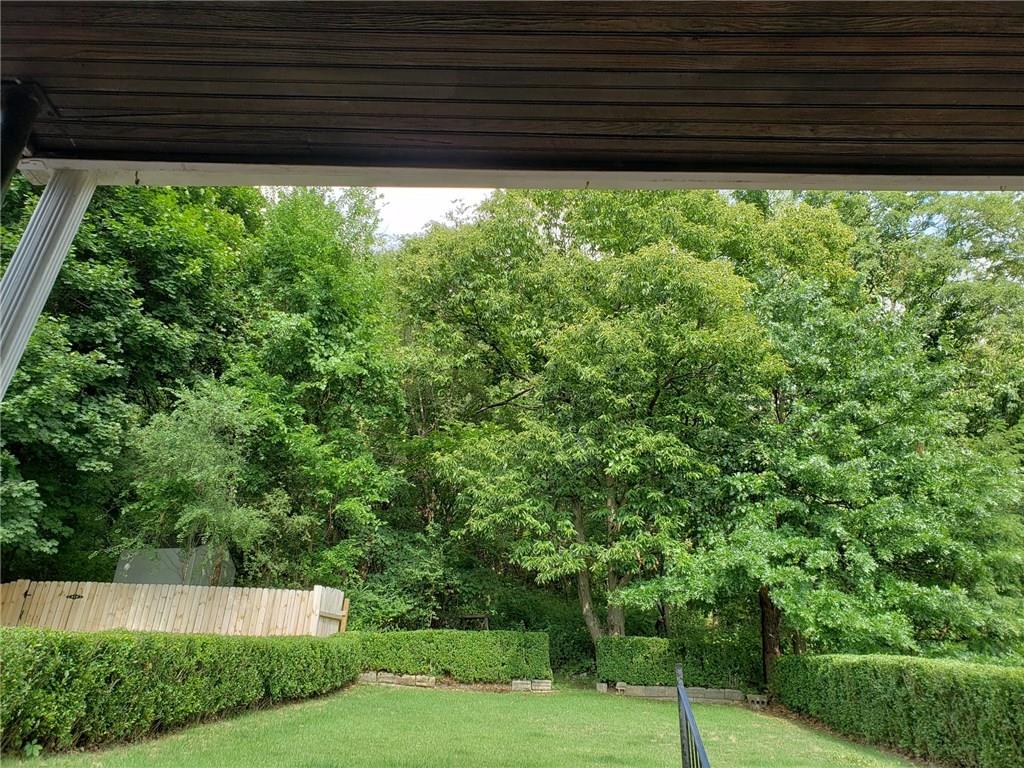 2224 Beaver Road Ambridge, PA 15003 - Photo 22 of 25 A view of the private backyard from the patio. The yard borders Walter Panek Park.