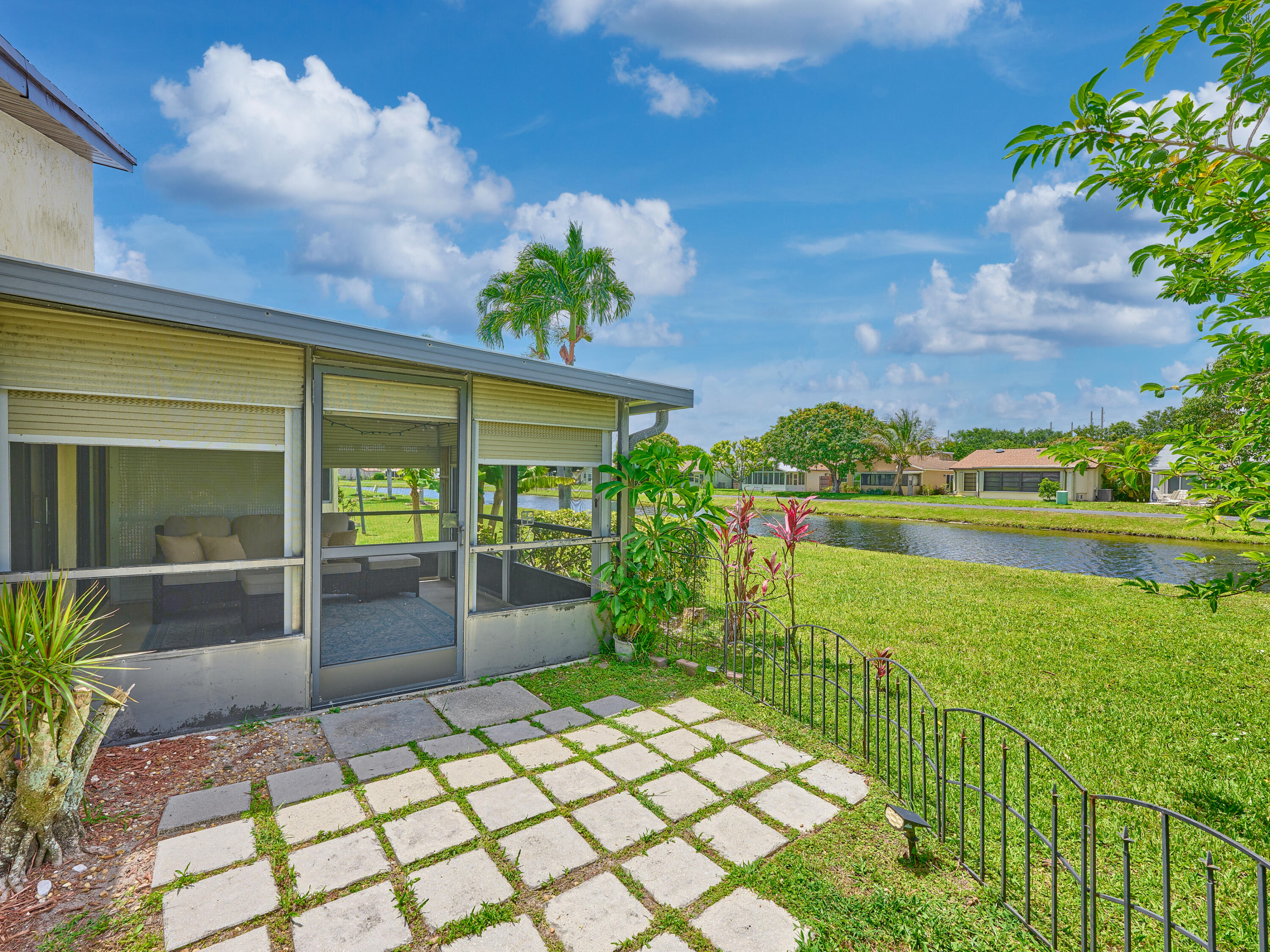 5197 Minto Road Boynton Beach, FL 33472 - Photo 23 of 32 a view of a porch with a garden
