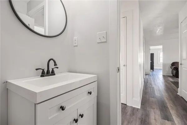 a view of a sink and a mirror