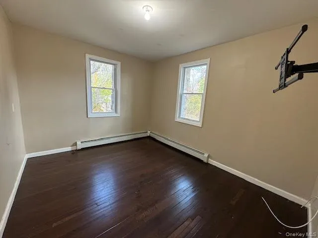 a bathroom with a toilet sink and a shower