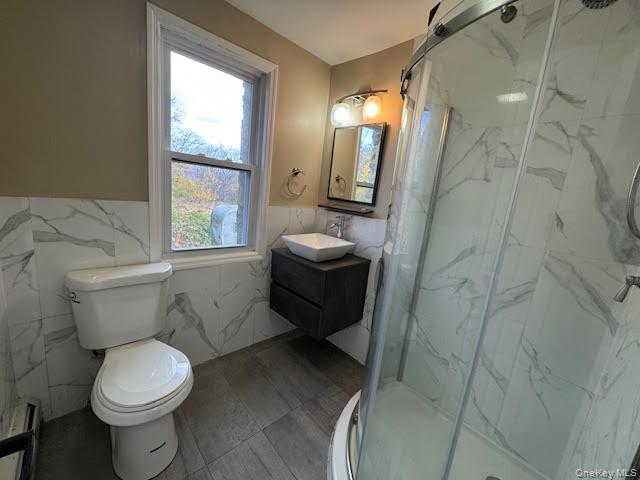 177 Riley Road New Windsor, NY 12553 - Photo 20 of 39 a bathroom with a toilet sink and a shower