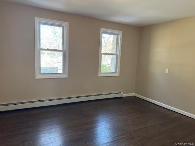 177 Riley Road New Windsor, NY 12553 - Photo 26 of 39 an empty room with wooden floor and windows