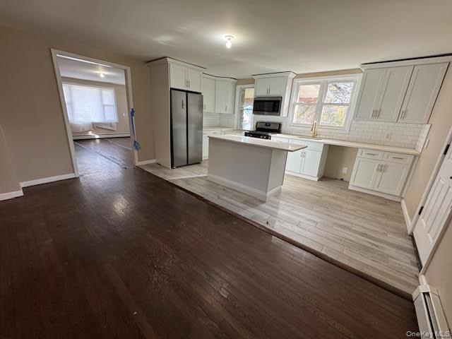 177 Riley Road New Windsor, NY 12553 - Photo 6 of 39 a large kitchen with cabinets